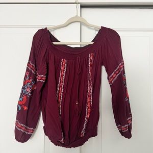 Long sleeve off the shoulder shirt, size medium with stitched detailing